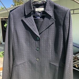 Tahari black pantsuit: blazer and pencil skirt.